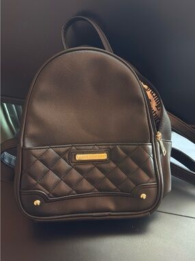 Juicy Couture Black Quilted Mini Backpack with Gold Accents